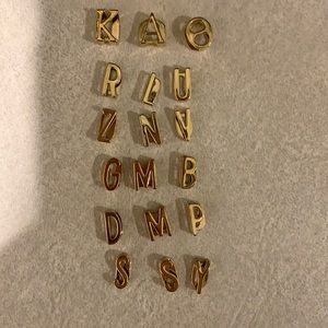 Keep Collective gold letter charms. Set of 18